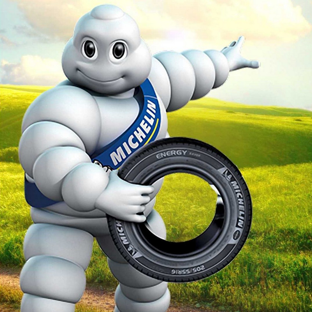 Почему составленный из шин символ компании Michelin Бибендум белый, а не чёрный?